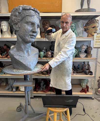 The artist with a printed head, ready for surface work.
