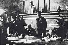 Greek Prime Minister Eleftherios Venizelos signs the Treaty of Lausanne, July 24, 1923.
